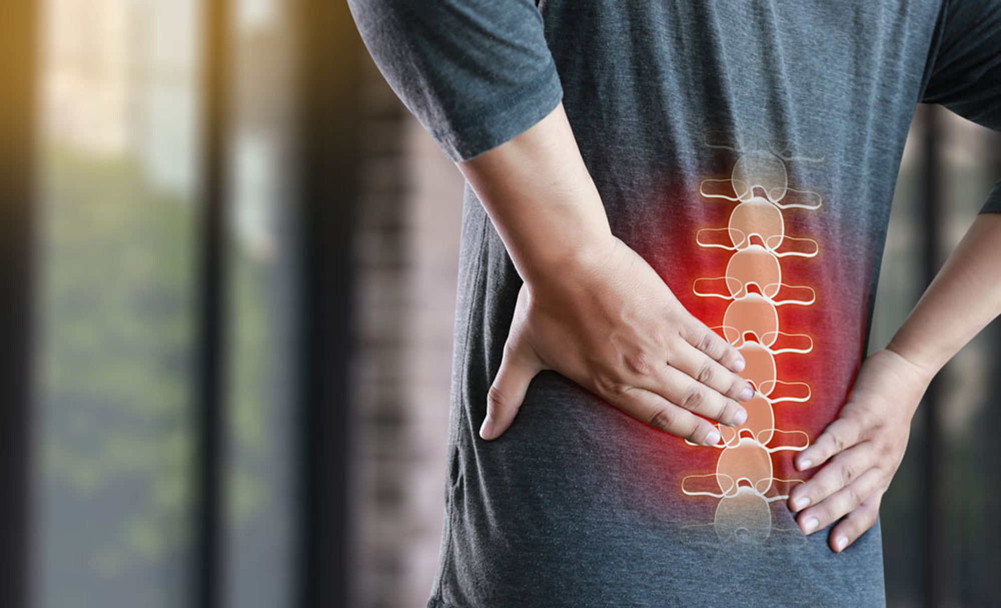 Back pain infographic of a spine on a man